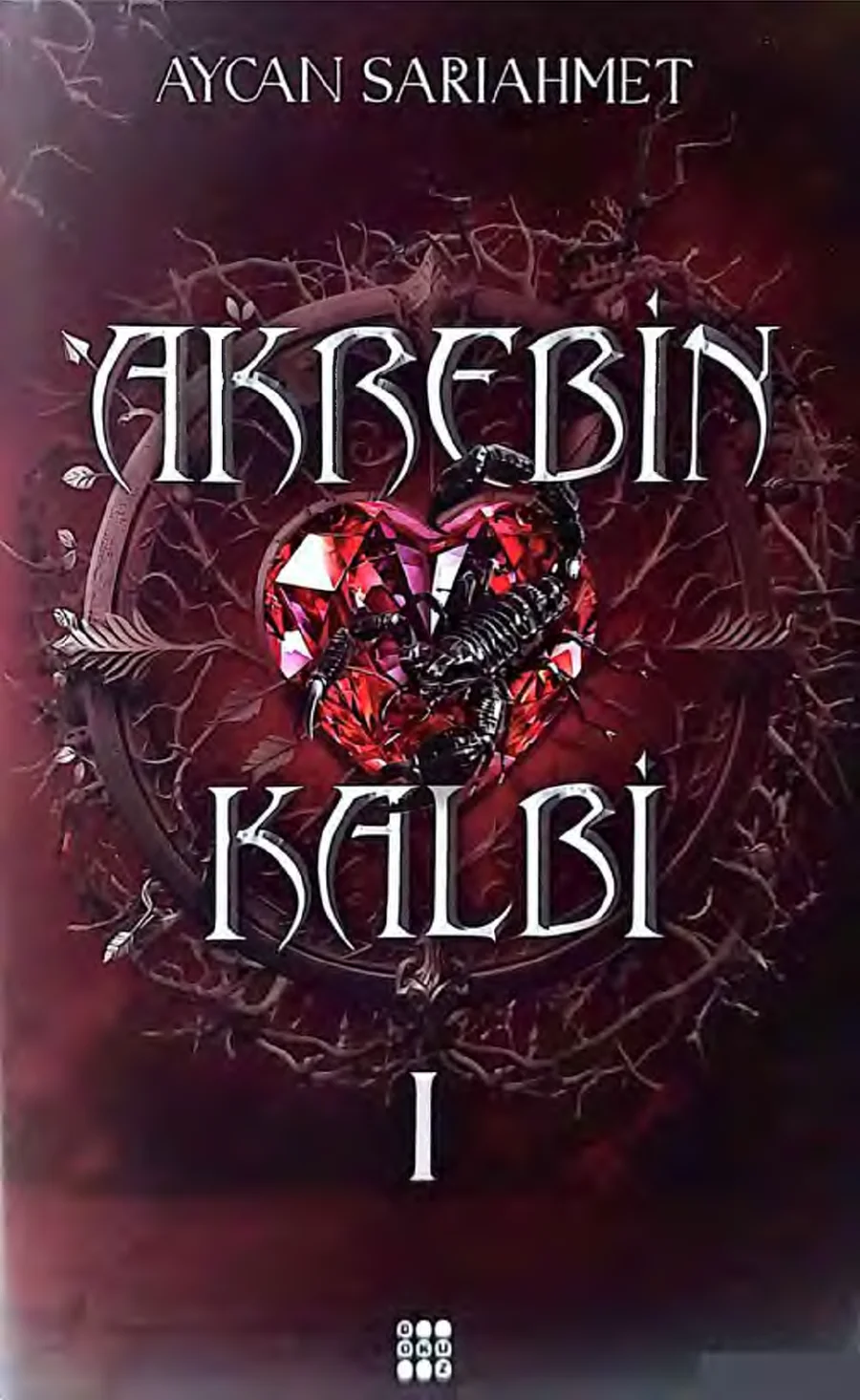 Akrebin Kalbi 1 kapak görseli