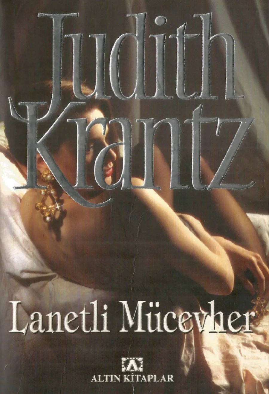 Lanetli Mücevher kitap kapağı